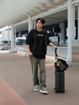 目黒蓮の空港コーデ。